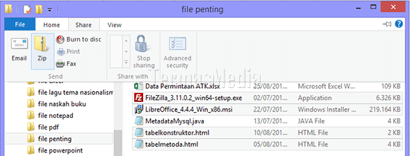 Mengkompres (zip) dan mengekstrak (unzip) file-file di Windows